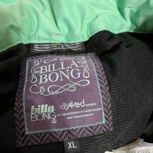 Womens Black Billabong ski pants with sea foam green cinch waist.